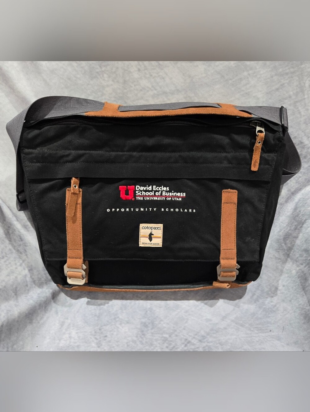 cotopaxi Black and Brown Suede-Trim Messenger Bag with Red Embroidery